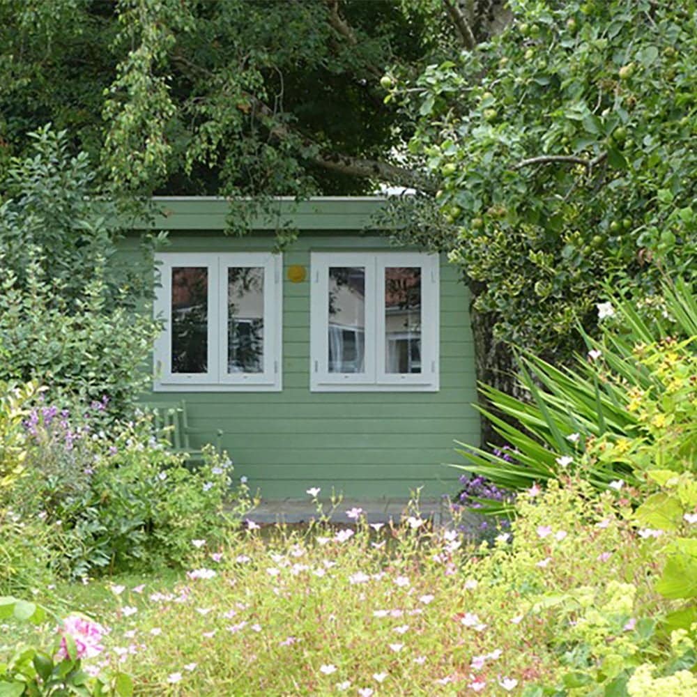 Tuinhuisje zacht groene houtverf